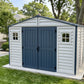 Duramax RidgeLine 10.5x8 vinyl storage shed 10114 in a landscaped backyard