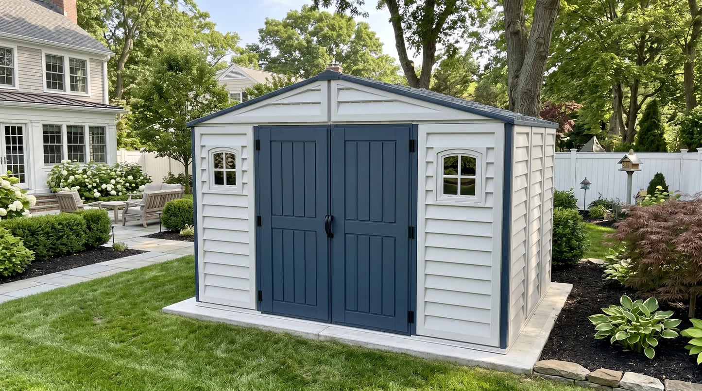 Duramax RidgeLine 10.5x8 vinyl storage shed 10114 in a landscaped backyard