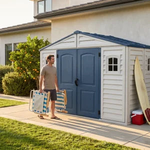Duramax RidgeLine 10.5x5 vinyl storage shed 10105 beside a home with outdoor gear nearby, view 2