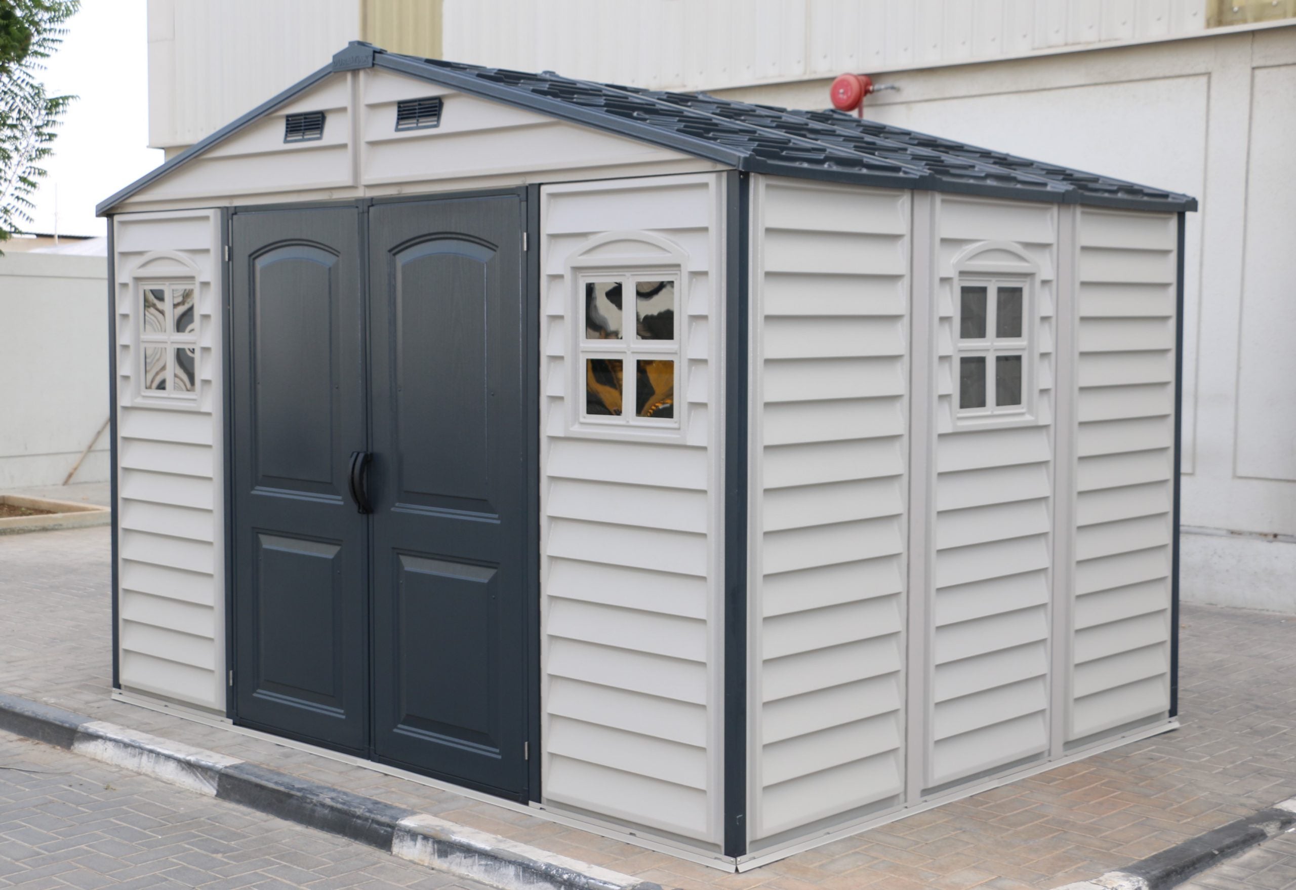 Woodside Plus 10'x8' Adobe with Foundation 30227 front angle lifestyle