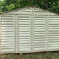 Duramax 10.5ft X13ft Woodbridge Vinyl Plus with Foundation 40234 CA rear view of shed in back yard
