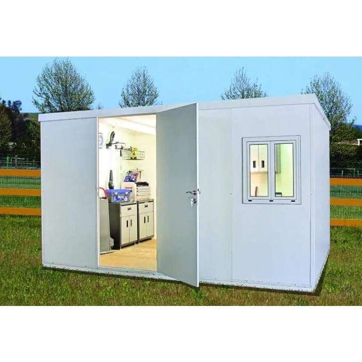 Duramax 16' x 10' Flat Roof Insulated Building 30852 view of shed in yard with interior lighted